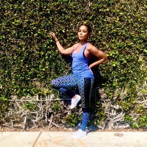 - High-waisted Amazing Blue Leggings 
- Fitted Razor-back Blue Tank-top